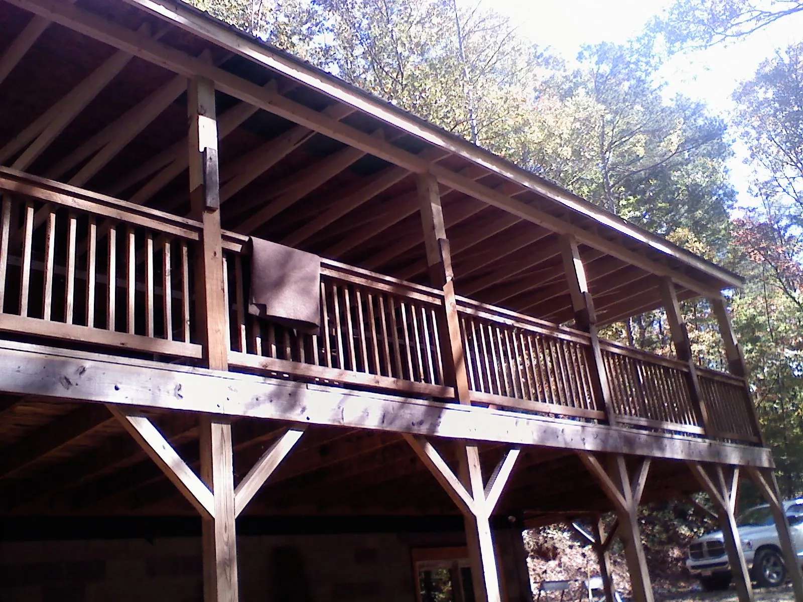 Timber framing under a new elevated porch and deck — Roof Leak Repair in Wilmore by Roofing Brothers